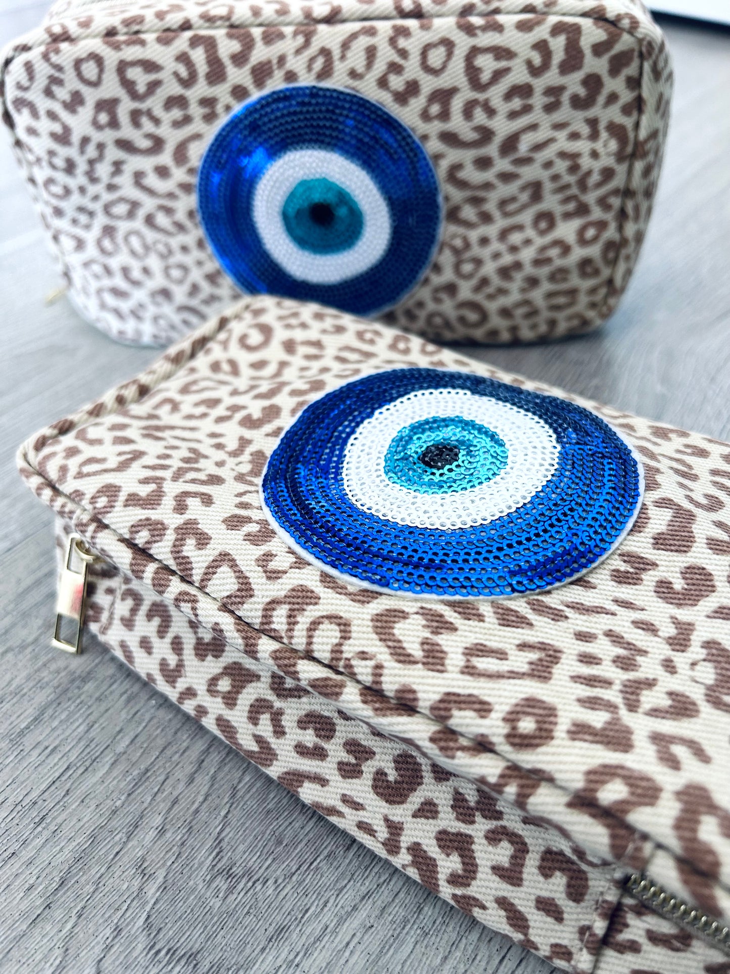 ANIMAL PRINT COSMETIC BAG WITH SEQUIN MATI