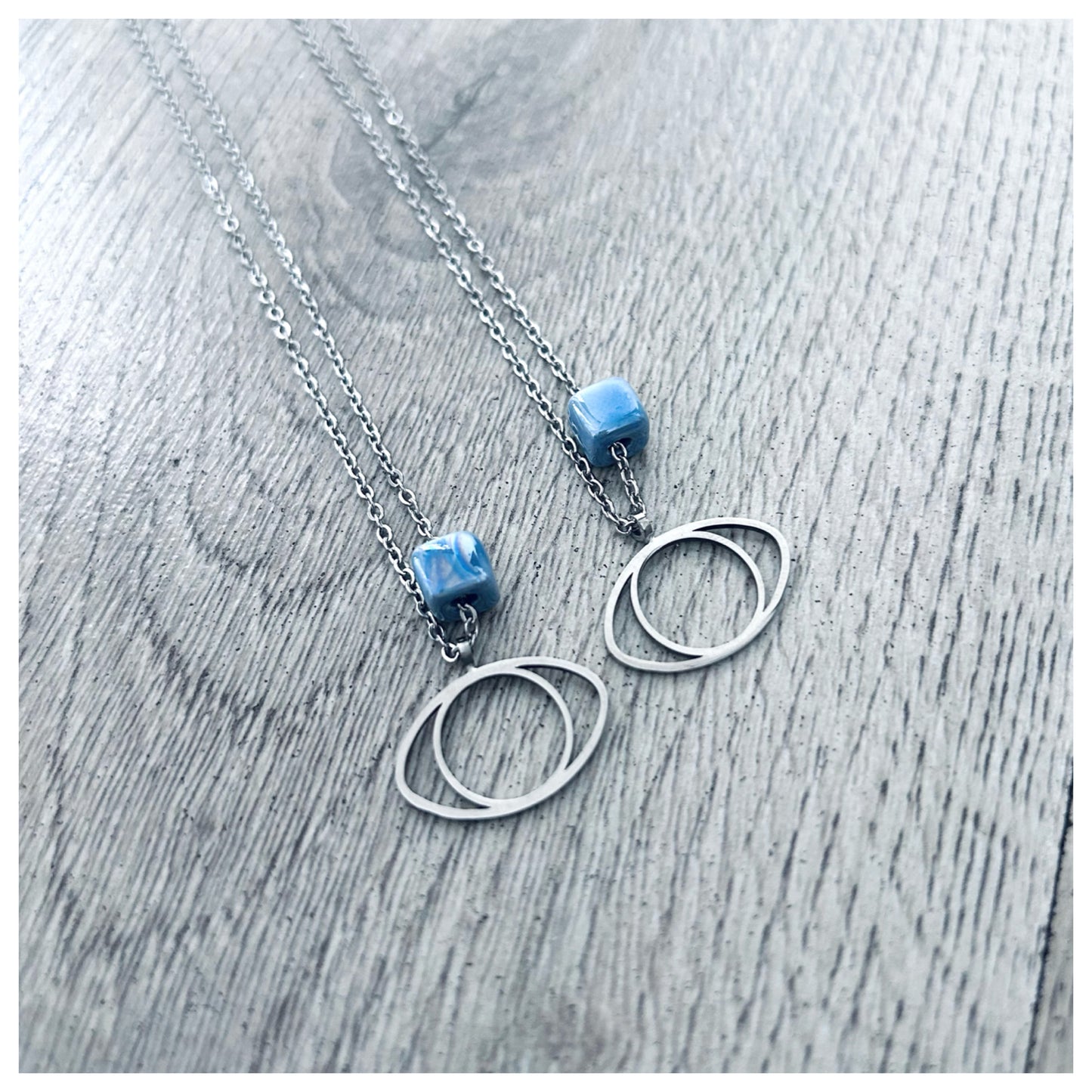 STAINLESS STEEL EYE CHARM & CERAMIC CUBE NECKLACE