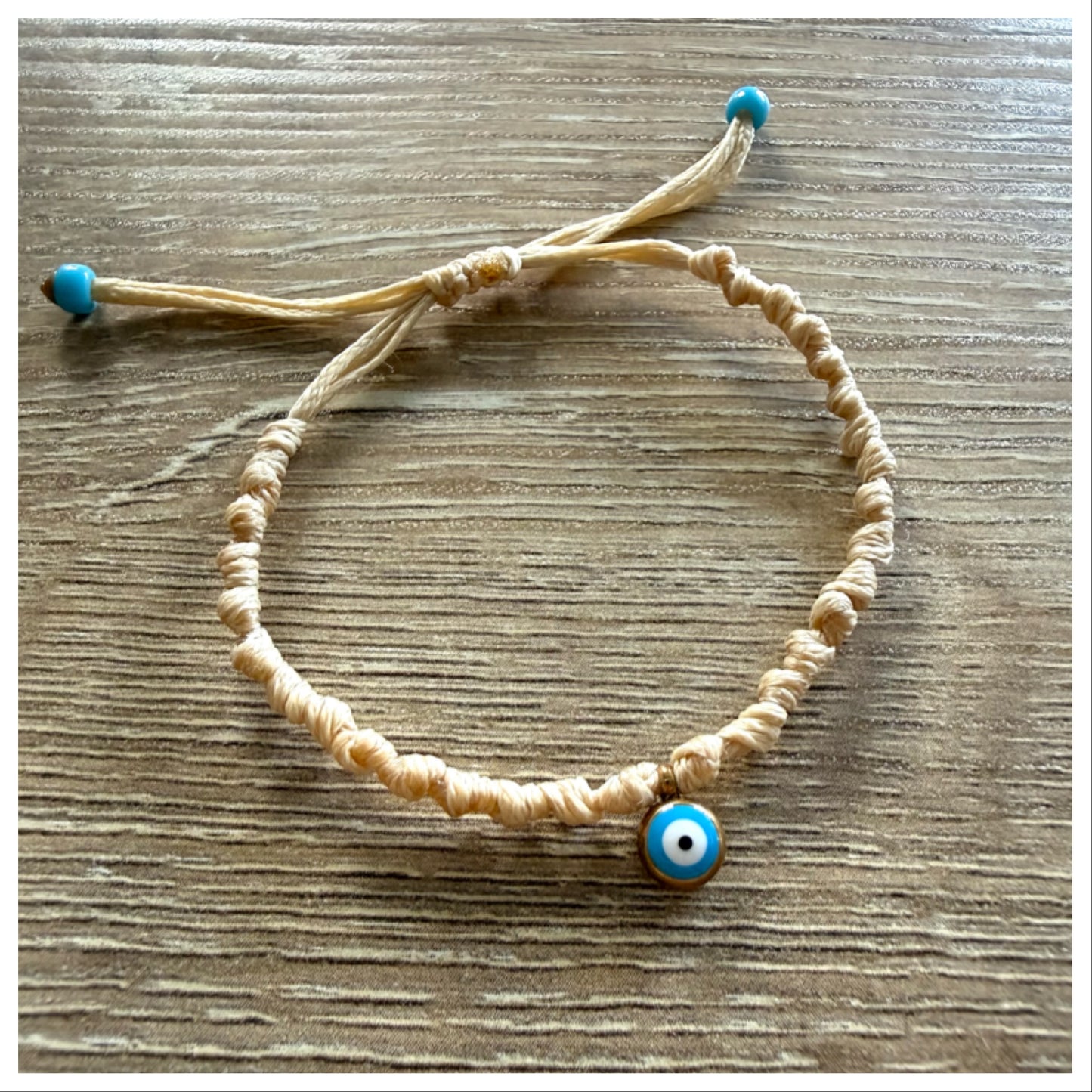 CREAM KNOTTED BRACELET