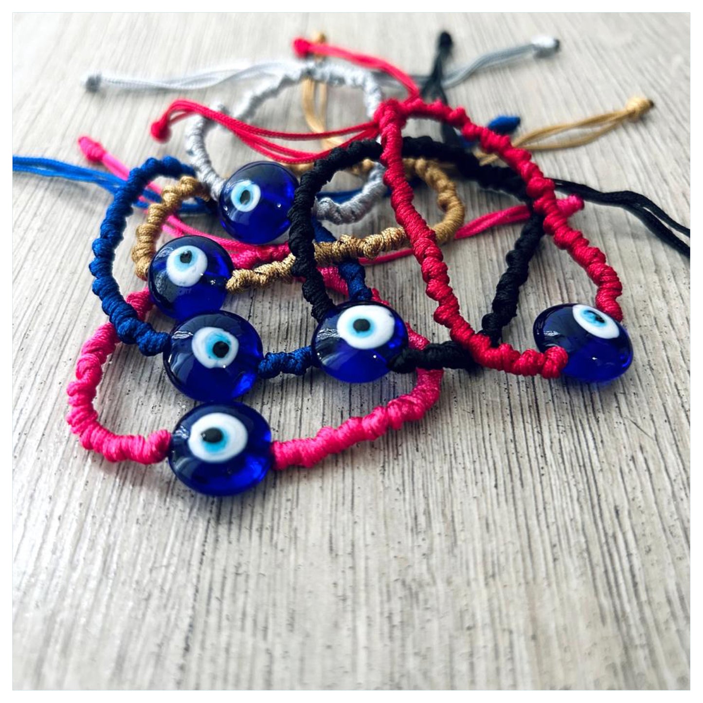 KNOTTED GLASS EYE ADJUSTABLE BRACELET