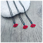 RED "KISS" CHARM NECKLACE