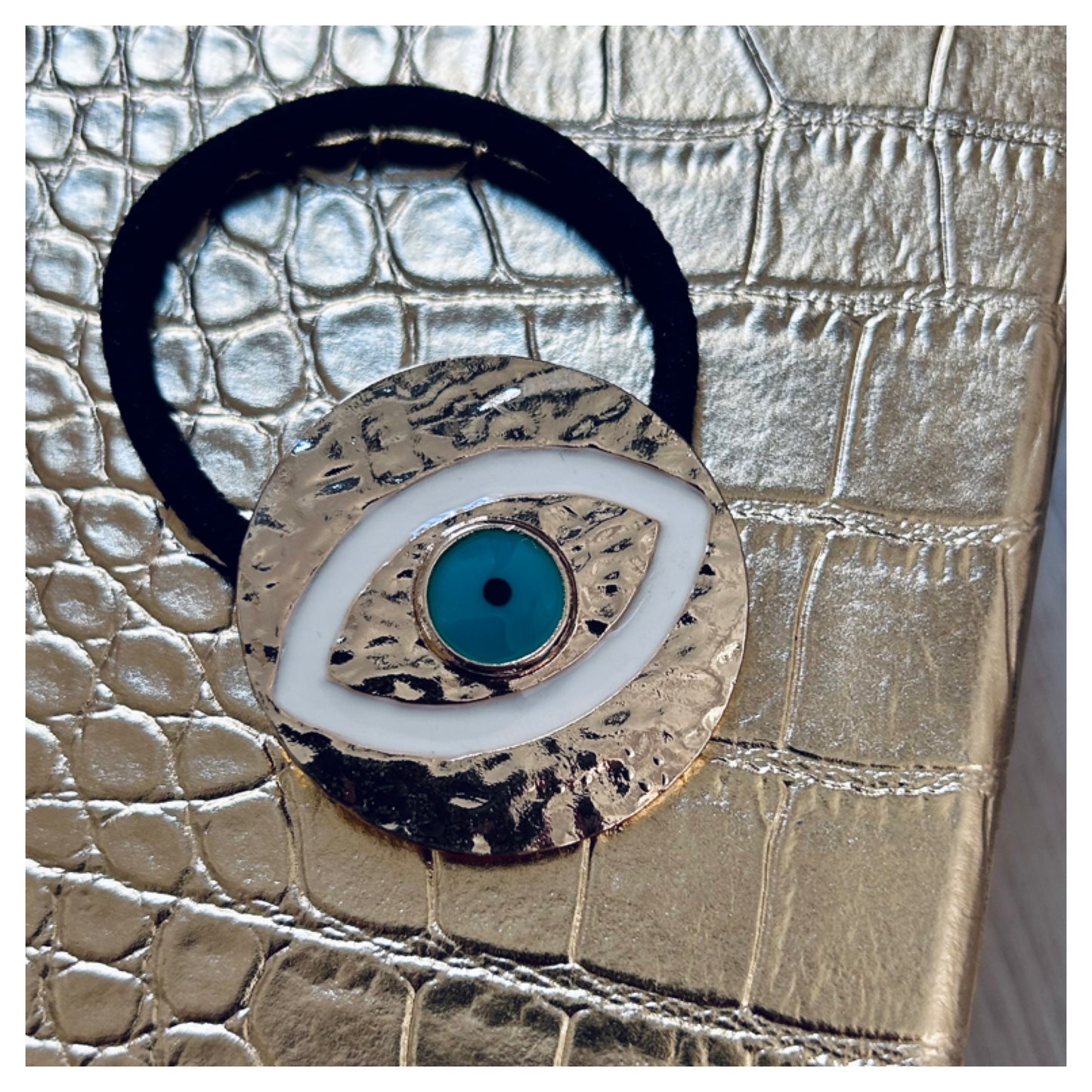 ROUND EVIL EYE HAIR BAND
